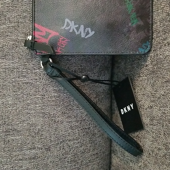 Nwt DKNY medium black graffiti wristlet. Retails $78 - Picture 4 of 9